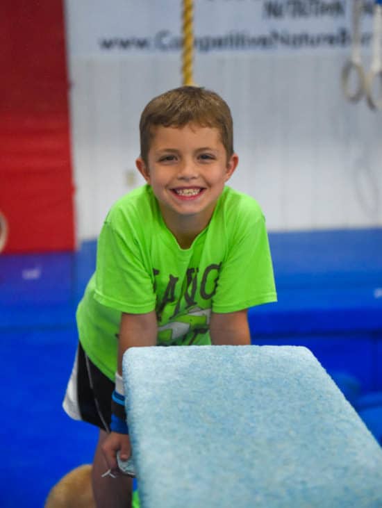 Boy smiling in class