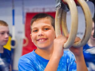 Boy smiling in class