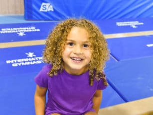 Young girl smiling in class