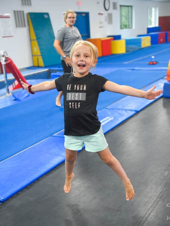 Girl jumping on the trampoline